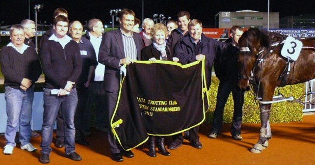 Owners, from left to right, Lyndon, Frances and Max Bowden, hold the dress rug after Princeton's win at the Hororata meeting at Adidngton on May 25. Princeton_owners
